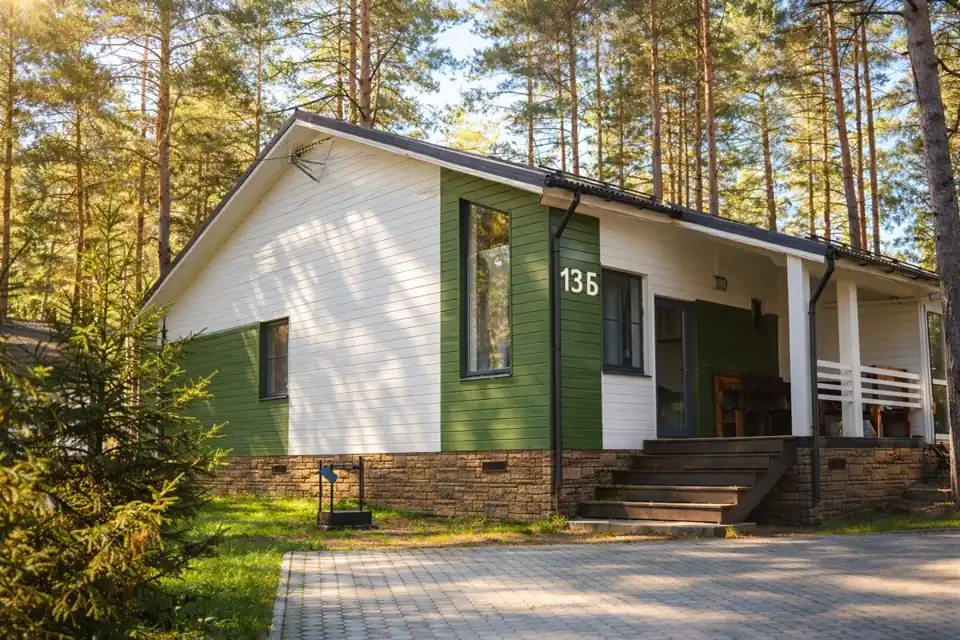 Скандинавский коттедж 70 м² с двумя спальнями и сауной