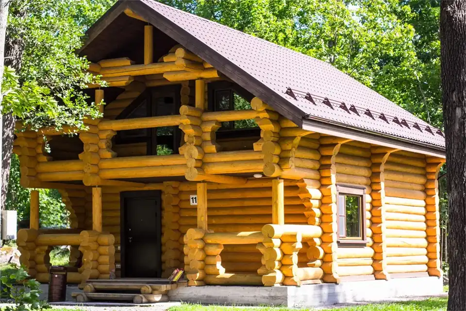 Бревенчатый коттедж 120 м² с видом на озеро