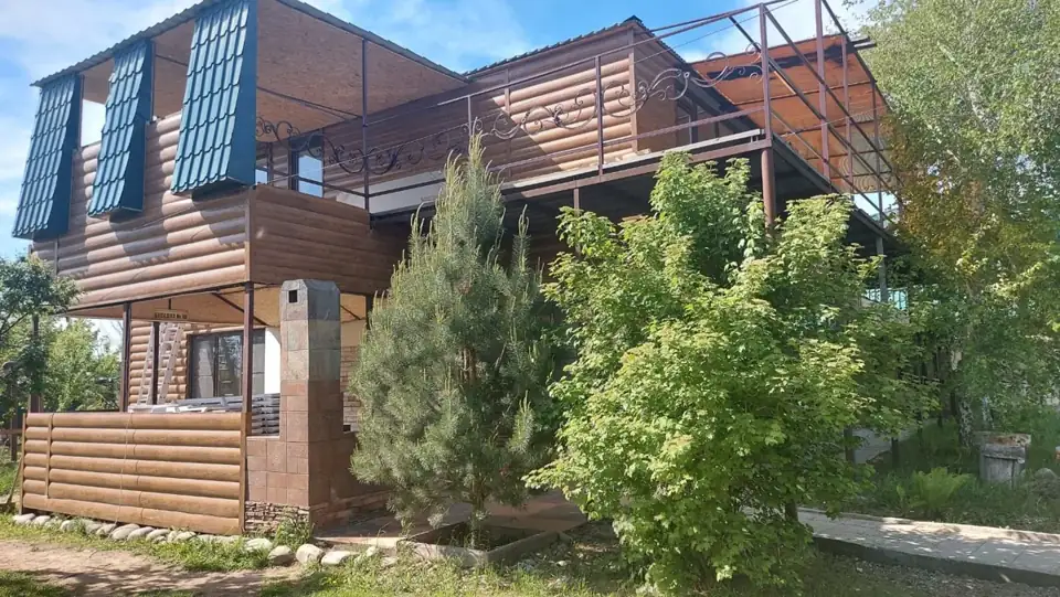 «Дом Дракона» с панорамными окнами на реку